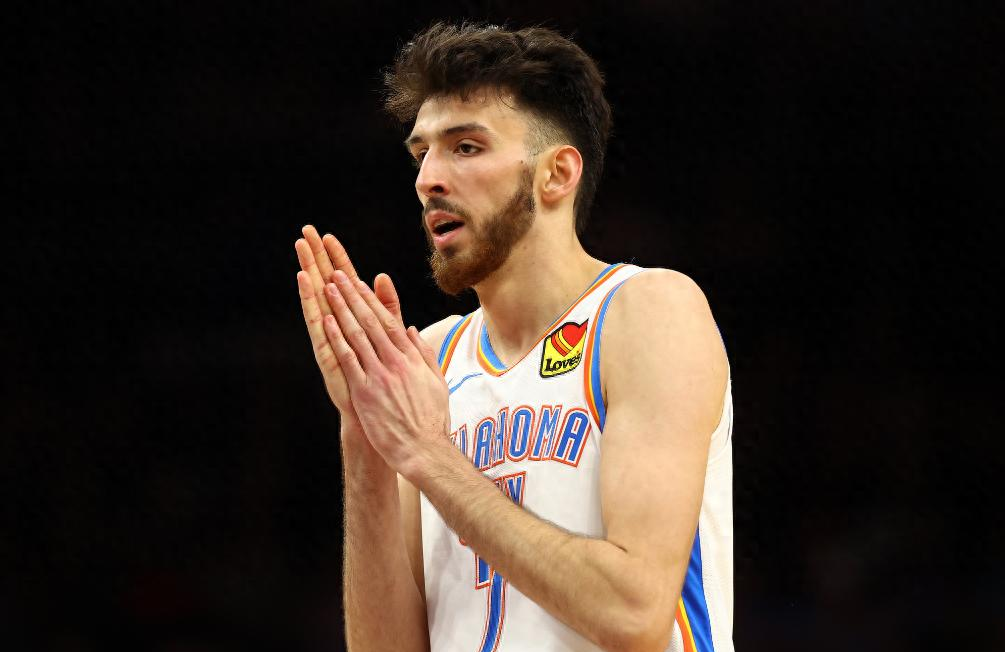 爱游戏-灰熊队全队合力,战胜马刺队,取得近期一次胜利